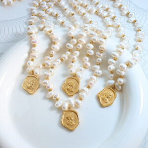 gold-pendant-pearl-necklace.jpg